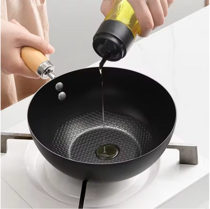 Wok antiadhésif en fonte