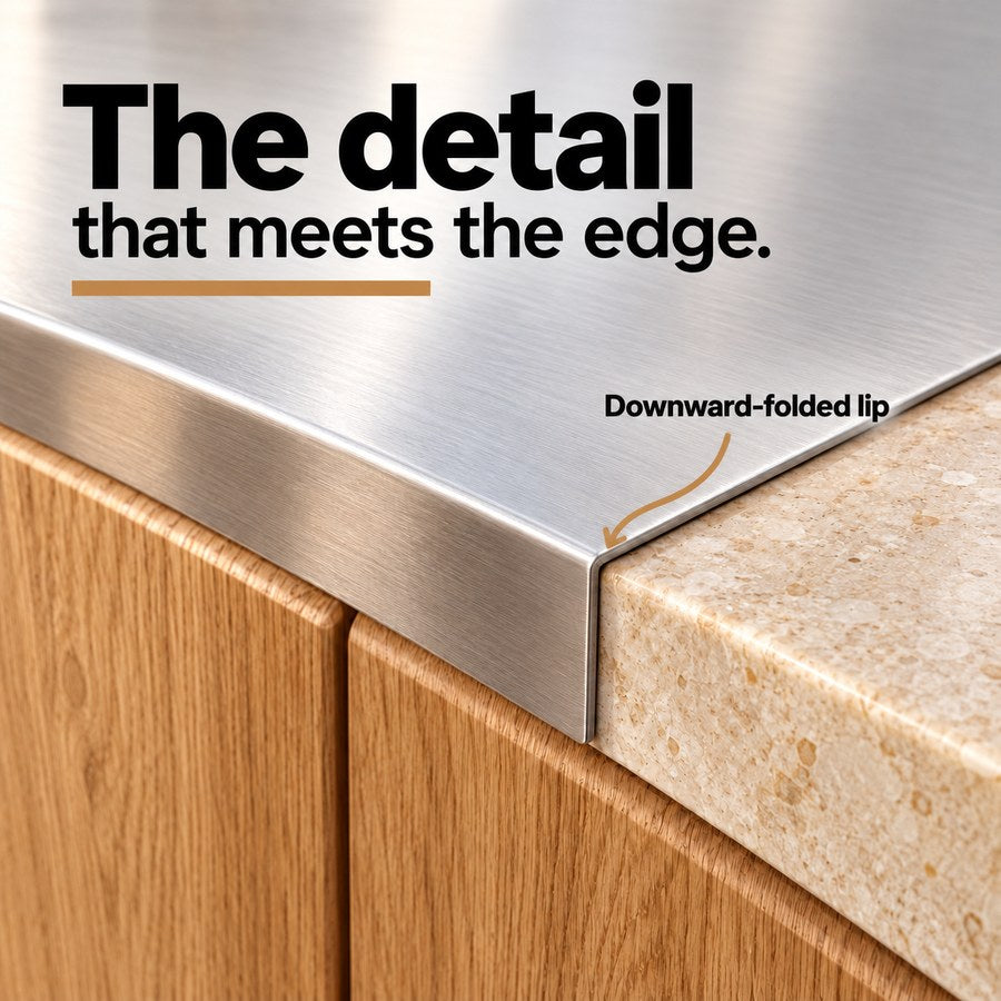 The detail that meets the edge. Downward-folded lip — stainless steel cutting board with downward countertop lip